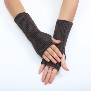 Close-up of dark grey knitted fingerless arm warmers with fine striped texture detail