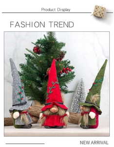 Detailed view of three festive Christmas gnomes in grey red and green holiday settings