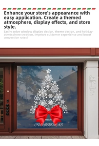 Detail of Christmas tree window sticker with white snowflakes and red bow decoration