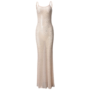 Gros plan sur la robe en maille champagne avec paillettes argentées et texture voile
