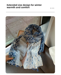 Detail of bohemian indigo scarf featuring geometric prints, tassels, and wood beads decor