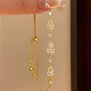 Bracelet gourde élégant plaqué or 18k avec perles et pierres de zircone scintillantes