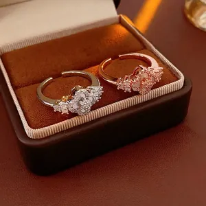 Luxurious rhombus flower open rings with white shell and zircon in silver and rose gold