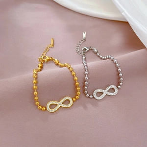 Infinity symbol bead bracelets in gold and silver titanium steel with zircon accents