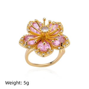 Exquisite gold floral ring with five pink pear-shaped zircons and tiny diamond accents
