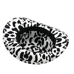 Thick cow print western cowboy hat with wide rolled brim and black interior lining