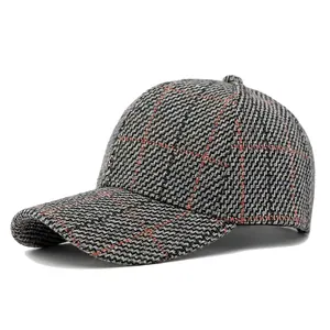 Classic houndstooth plaid baseball cap with orange stripe details and stiff structured crown