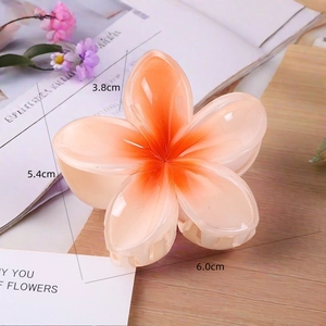 Detailed dimensions of the orange gradient plumeria hair claw clip with size annotations