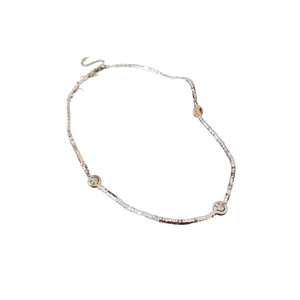 Silver smiley face necklace with crushed silver beads on a minimalist collar chain