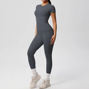 Detail of dark grey brushed yoga set featuring tight short sleeve top and high waist leggings