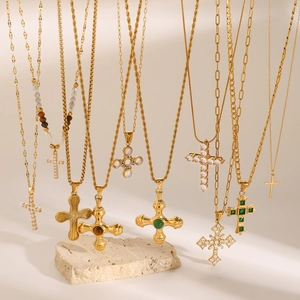 Gold stainless steel cross pendant necklaces with zircon and pearl accents on stone