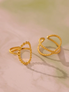 Detail of 18k gold plated stainless steel beaded double layer and crisscross rings