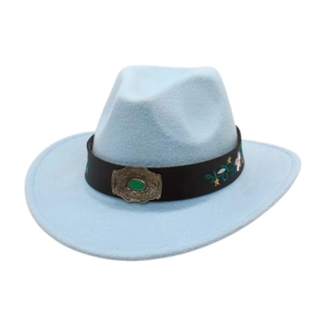 Detail of light blue fedora featuring floral embroidery and a green gemstone buckle