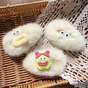 Three cute plush cream-white hair clips with cartoon big eyes and yellow beak designs