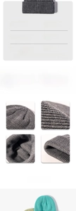 Detailed close-up of grey acrylic knit beanie with fine rib texture and size specifications