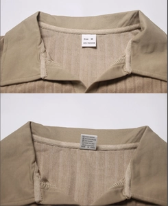 Detailansicht eines khakifarbenen Poloshirts mit M-Kragenetikett und Waschhinweisen