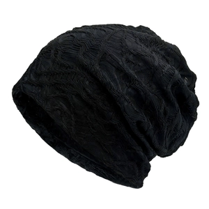 Minimalist black slouchy beanie with stylish double-layered textured knitted ripple design