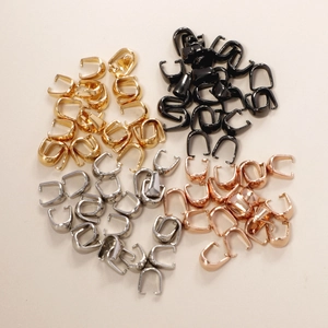 Stainless steel jewelry bails in gold, silver, black, and rose gold flat lay display