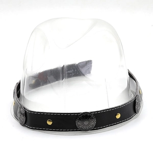 Detail of vintage leather hat band with silver floral conchos and gold rivets