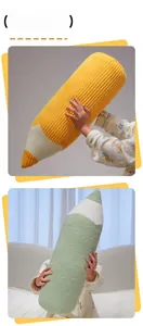 Macro detail of long pencil plush pillows in yellow and green corduroy fabric