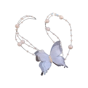 French style double-layer blue butterfly pendant necklace with pearls on white background