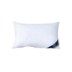 Premium white hotel pillow with navy blue brand label, minimalist flat lay display