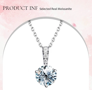 Close-up of three-prong S925 silver moissanite pendant on a delicate cable chain