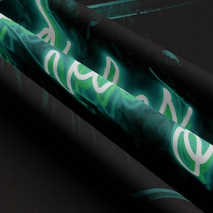 Macro detail of high-density black tapestry fabric with neon green smoke print texture