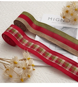 Detail of red and green striped linen ribbons for Christmas tree DIY decor and gift wrapping