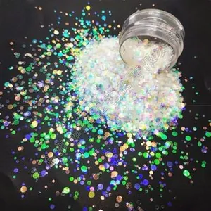 Macro detail of holographic cloud glitter flakes for nail art and DIY resin crafts