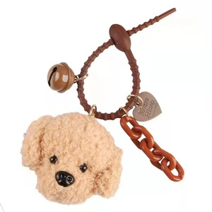 Brown teddy dog keychain with curly hair plush, matching bell and heart charm pendant