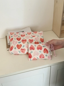 Set of two canvas makeup bags with watercolor heart print and secure zippers