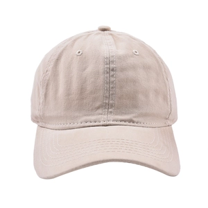 Detail of light beige washed cotton baseball cap with six-panel structure and vent holes