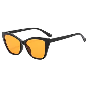 Fashionable cat eye sunglasses with black frame and vibrant orange lenses for women