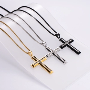 Three-piece set of stainless steel cross necklaces in gold, silver, and black with rhinestones