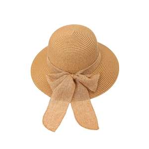 Women straw sun hat with large bow and wide brim for beach and casual outdoor sun protection