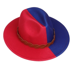 Detail view of red and blue color-block wool fedora hat with brown braided leather band