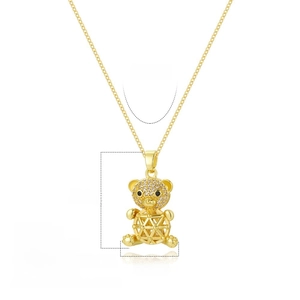 Detail of gold panda bear pendant with cubic zirconia inlay and geometric body