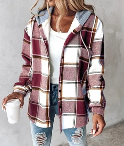 Detail of red and white plaid hooded flannel shirt featuring a drawstring and button-up front
