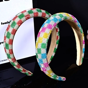 Checkerboard pattern colorful rhinestone headbands with sparkling crystals on black background