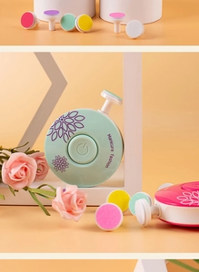 Detailed view of pink and green electric baby nail trimmers with colorful grinding heads