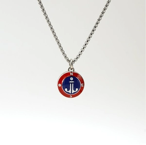 Detailed close-up of a silver box chain with a red and blue enamel nautical anchor pendant