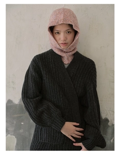 Close-up of pink flecked knit balaclava hood texture with grey cardigan details
