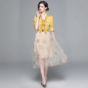 French style two-piece fashion set with yellow ruffle top and beige embroidered tulle skirt