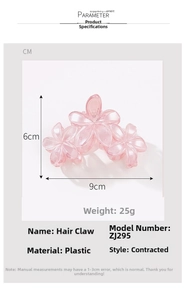 Detailed size specifications for pink floral hair claw measuring 9cm by 6cm