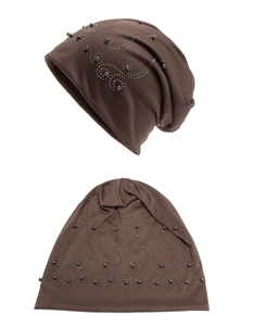 Detail of dark brown beanie with rhinestone scroll patterns and pearl embellishments
