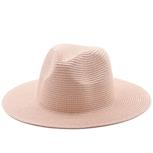 Detailed close-up of pink wide brim straw fedora hat featuring premium woven texture