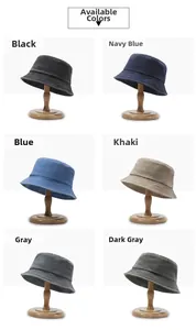 Detail view of denim bucket hats in six colors with breathable metal eyelets and stitching