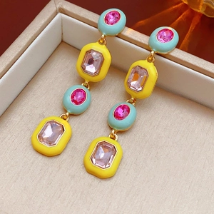 Vintage gold-toned drop earrings with turquoise and yellow enamel with pink gemstones