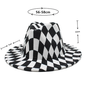Detail of black and white checkered wool fedora hat with 7cm brim and 12cm crown